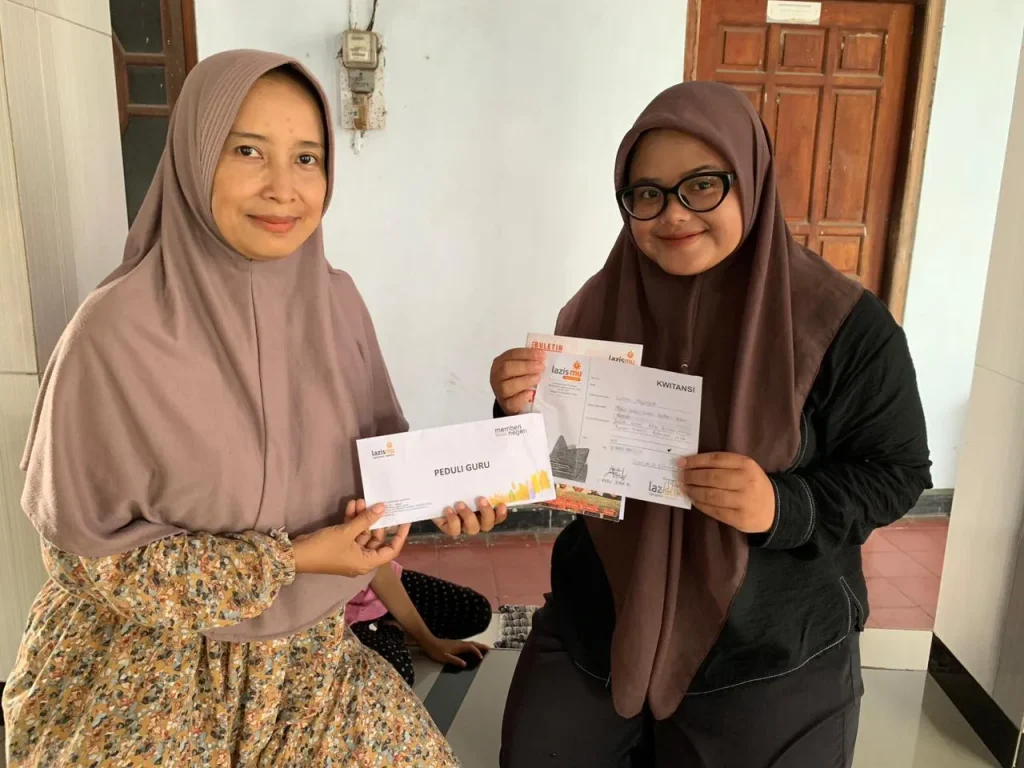 PEDULI GURU RTQ BAITURRAHMAN BARON PEDULI GURU RTQ BAITURRAHMAN BARON